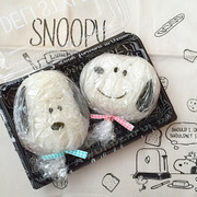 キャラ弁★スヌーピーのラップ巻きおにぎりの写真