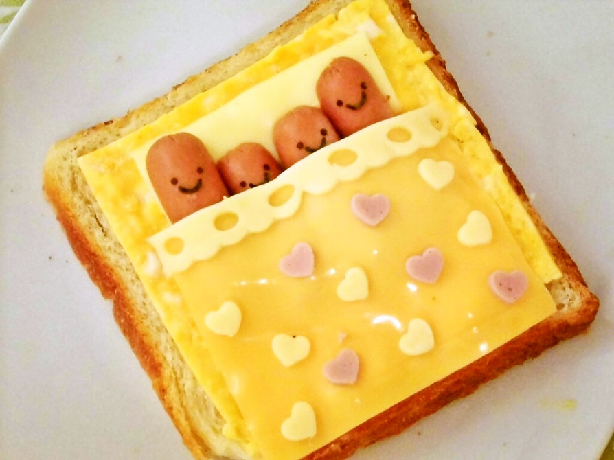 簡単☆チーズと卵の布団でねんねウインナーの画像