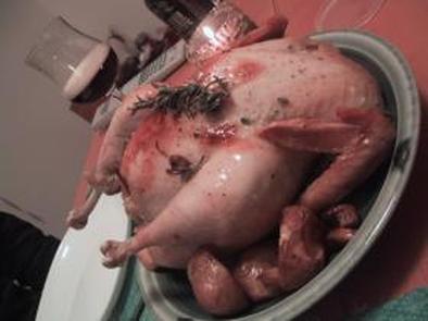 大和肉鶏でローストチキン（ガーリックライス入り）の写真