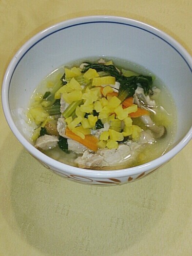 鶏肉と小松菜と漬物の優しい雑炊の写真