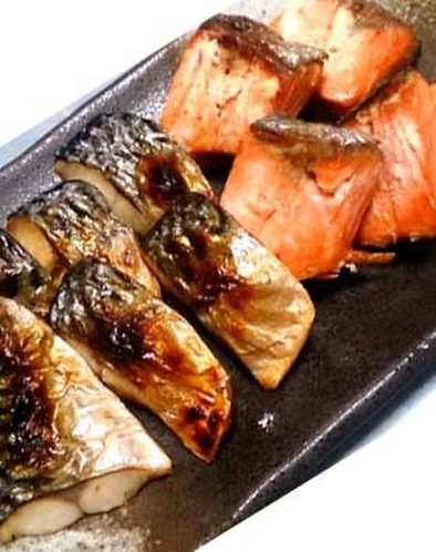 お弁当に冷凍自然解凍の焼き魚（鯖・鮭）の写真
