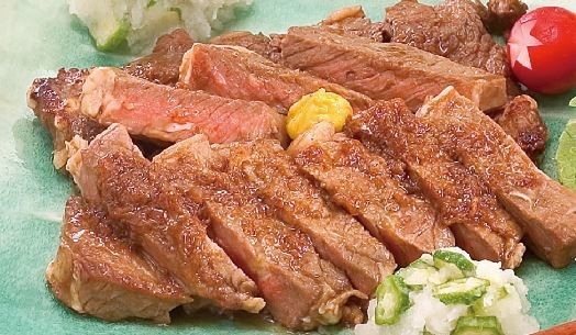 牛肉の玉ねぎ風味ソースステーキの画像