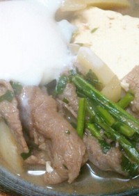 豆腐と牛肉の温泉卵落としの煮浸し