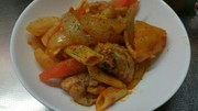 鶏もも骨付ぶつ切りトマト煮込みの写真