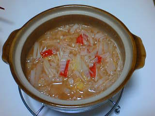 赤い雑炊♪酢豚味の画像