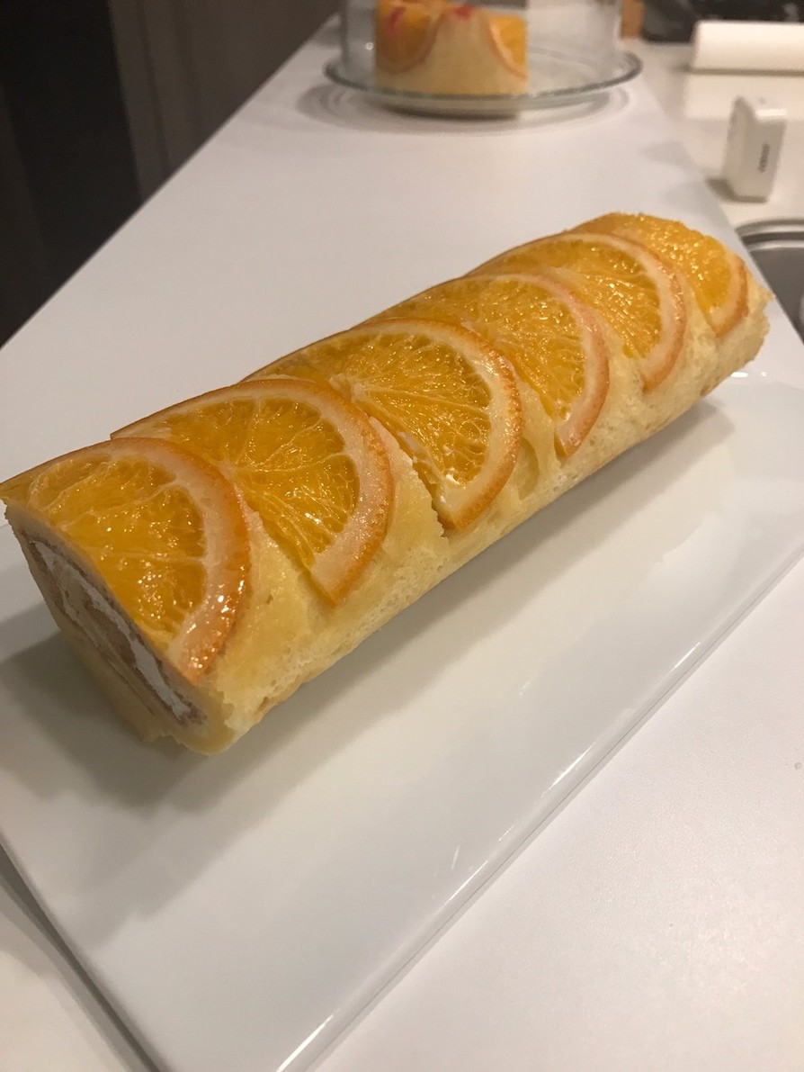 オレンジ・コンポートで作るロールケーキの画像