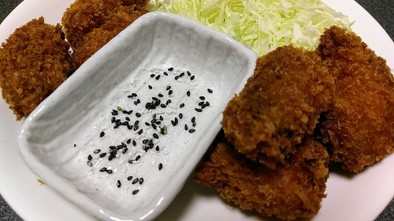 ごま塩で揚物は食べるフライとんかつ天ぷらの写真
