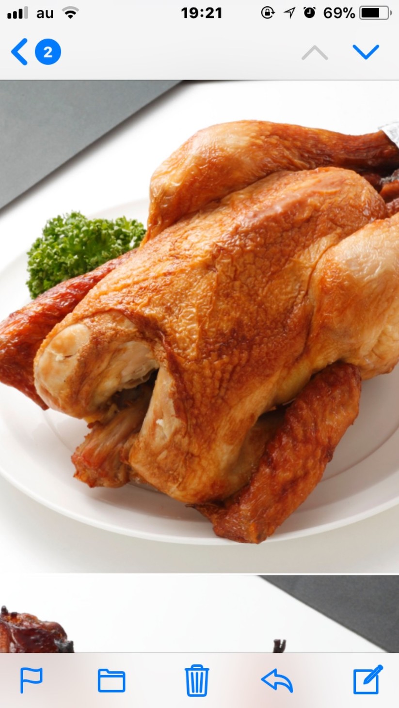 クリスマス赤鶏のローストチキン（丸鶏）の画像