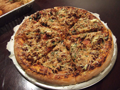 食べごたえ十分！ふんわり美味しいピザ生地の写真