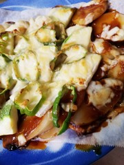 新じゃがとズッキーニのチーズ焼きの写真