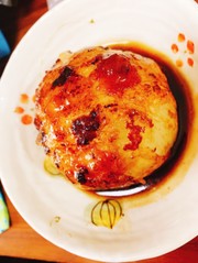 新玉ねぎのまるごと肉巻きの写真