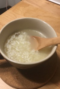 鍋の後の出汁で米から作る雑炊