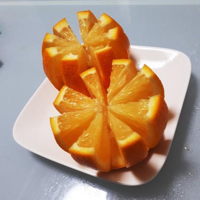 オレンジ飾り切り（上が平）の写真