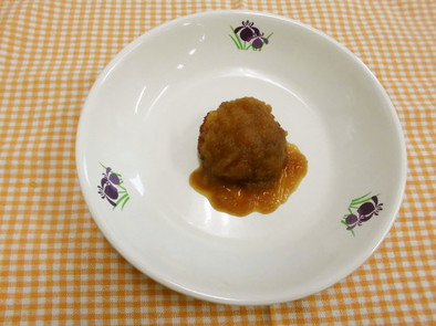 豆腐ハンバーグとオニオンソースの写真