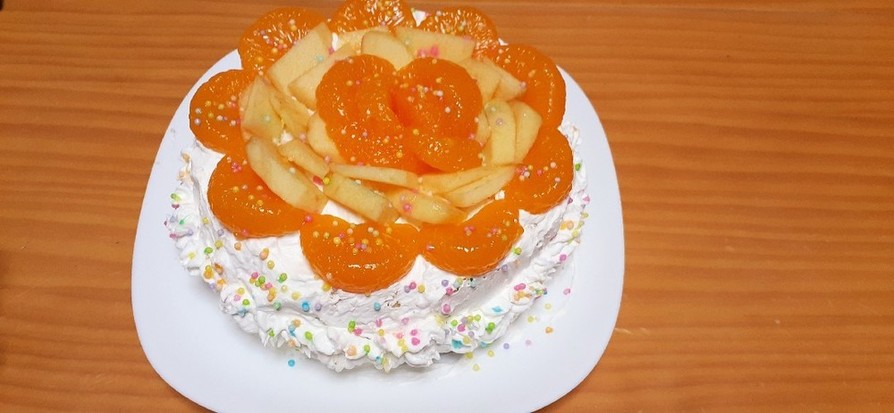 みかんとりんごのケーキの画像