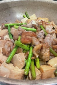 豚肉と豆腐とニンニクの芽炒め