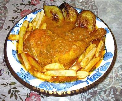 イラン料理　鶏のサフラン・トマト煮込みの写真